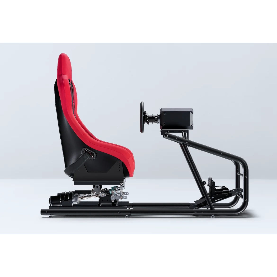 DOF Reality 2-Axis Mover (M2) - side view of seat mover installed in racing rig with red bucket seat and wheel base