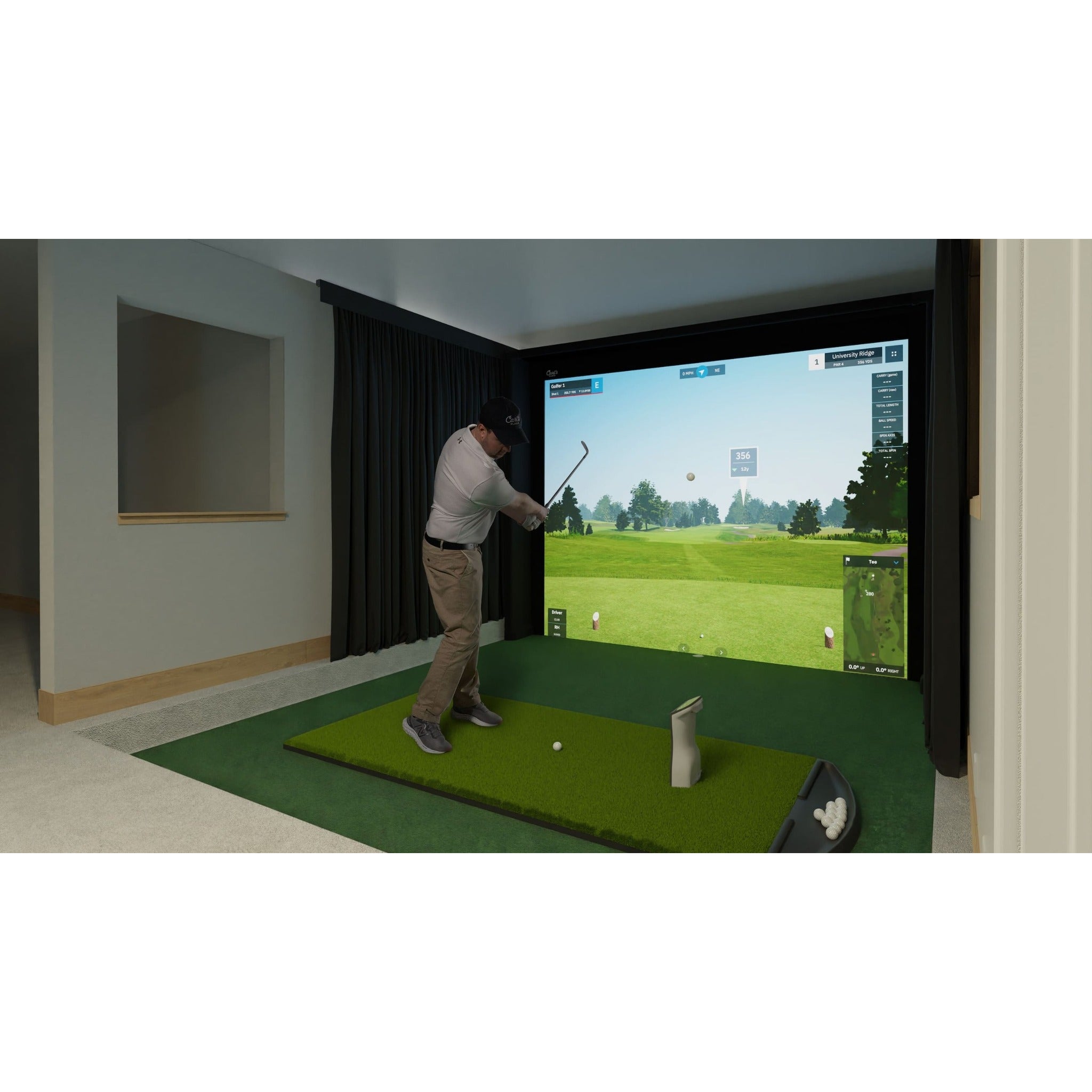 Carl's Place DIY Golf Simulator Enclosure Kit - golfer mid-swing in a finished home golf room with the kit installed