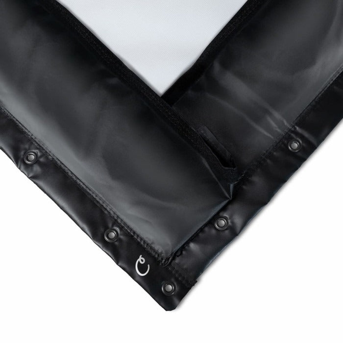 Carl's Place Preferred Impact Screen - corner folded back of classic impact screen with flaps, showing the black border, grommets and hook-and-loop tape